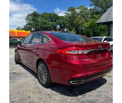 2017 Ford Fusion for sale is a Red 2017 Ford Fusion Car for Sale in Houston TX