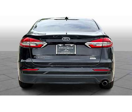 2020UsedFordUsedFusionUsedFWD is a Black 2020 Ford Fusion Car for Sale in Houston TX