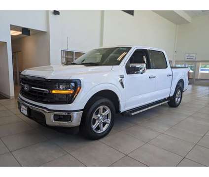 2024 Ford F-150 XLT is a White 2024 Ford F-150 XLT Car for Sale in Collins MS