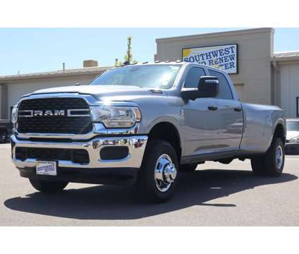 2023 Ram 3500 Tradesman is a Silver 2023 RAM 3500 Model Tradesman Car for Sale in Pueblo CO