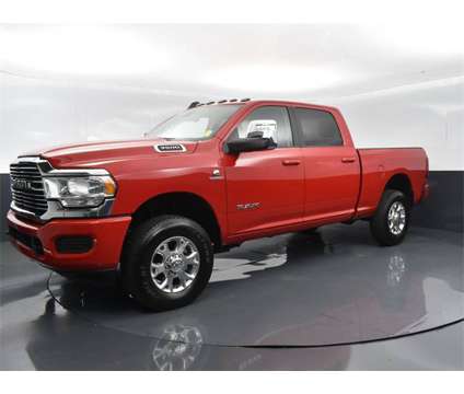 2023 Ram 3500 Laramie is a Red 2023 RAM 3500 Model Laramie Truck in Columbus GA