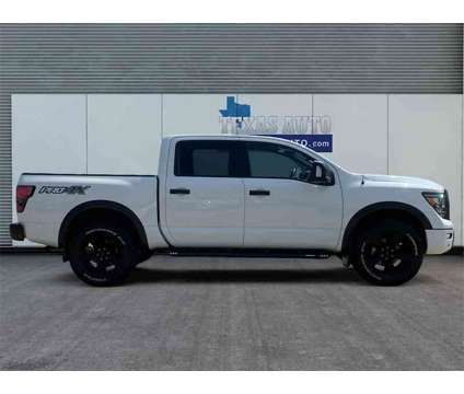 2021 Nissan Titan PRO-4X is a White 2021 Nissan Titan PRO-4X Truck in Houston TX