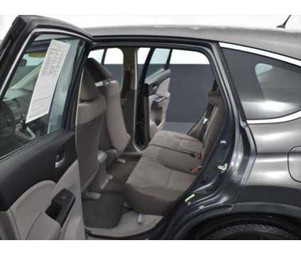 2014 Honda CR-V LX is a Grey 2014 Honda CR-V LX SUV in Mcdonough GA
