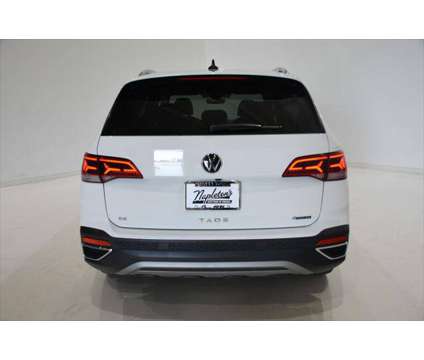 2023 Volkswagen Taos 1.5T SE is a White 2023 SUV in Urbana IL