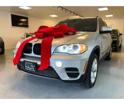2013 BMW X5 for sale is a Silver 2013 BMW X5 3.0si Car for Sale in Santa Ana CA