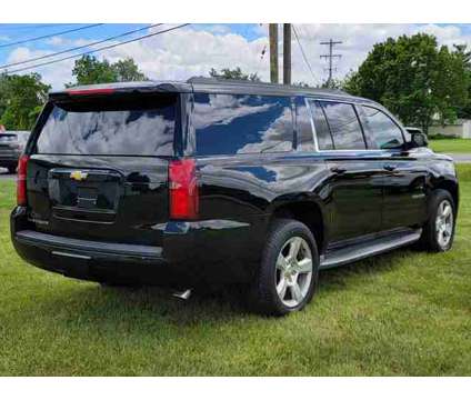 2015 Chevrolet Suburban for sale is a Black 2015 Chevrolet Suburban 2500 Trim Car for Sale in Adrian MI