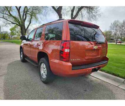 2011 Chevrolet Tahoe for sale is a Orange 2011 Chevrolet Tahoe 1500 4dr Car for Sale in Nampa ID