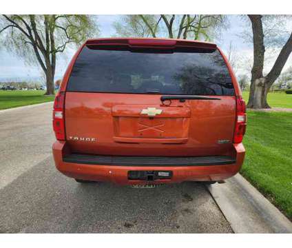 2011 Chevrolet Tahoe for sale is a Orange 2011 Chevrolet Tahoe 1500 4dr Car for Sale in Nampa ID