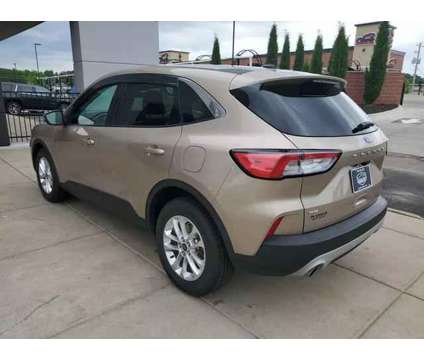 2021 Ford Escape for sale is a Gold 2021 Ford Escape Car for Sale in Topeka KS