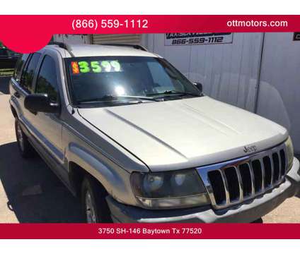 2003 Jeep Grand Cherokee for sale is a Gold 2003 Jeep grand cherokee Car for Sale in Baytown TX