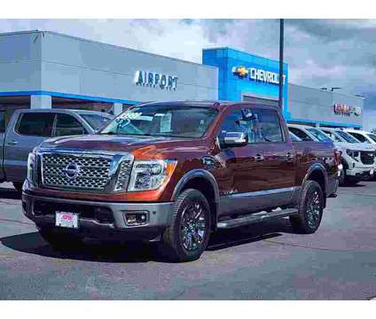 2017UsedNissanUsedTitanUsed4x4 Crew Cab is a Gold 2017 Nissan Titan Car for Sale in Medford OR