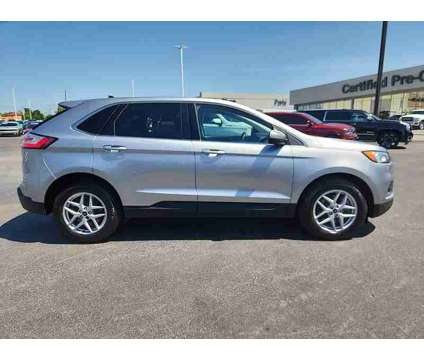 2022UsedFordUsedEdgeUsedAWD is a Silver 2022 Ford Edge Car for Sale in Houston TX