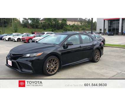 2024 Toyota Camry SE Nightshade is a Black 2024 Toyota Camry SE Car for Sale in Hattiesburg MS