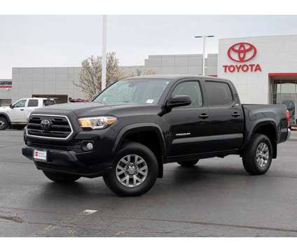 2018 Toyota Tacoma SR5 is a Black 2018 Toyota Tacoma SR5 Truck in Naperville IL