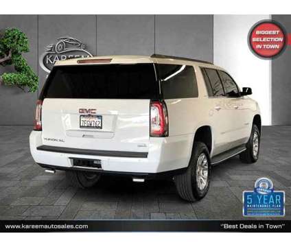 2015 GMC Yukon XL SLT is a White 2015 GMC Yukon XL SLT Car for Sale in Sacramento CA