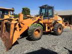 CASE 721D wheel loader with attachments