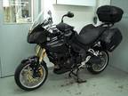2010 Triumph Tiger 1050, only 2660 miles, black. Like new condition