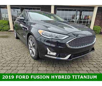 2019 Ford Fusion Hybrid Titanium is a Black 2019 Ford Fusion Hybrid Titanium Hybrid in Bowling Green OH