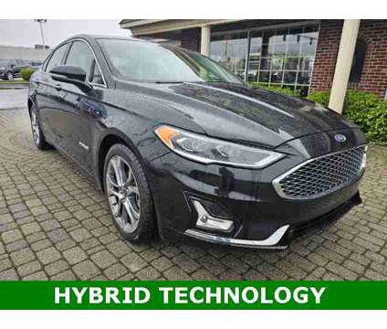 2019 Ford Fusion Hybrid Titanium is a Black 2019 Ford Fusion Hybrid Titanium Hybrid in Bowling Green OH