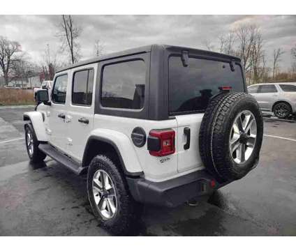 2020 Jeep Wrangler Unlimited Sahara is a White 2020 Jeep Wrangler Unlimited Sahara SUV in Ransomville NY