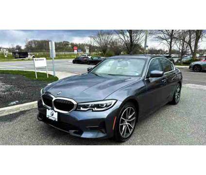 2021 BMW 3 Series xDrive is a Grey 2021 BMW 3-Series Sedan in Bay Shore NY