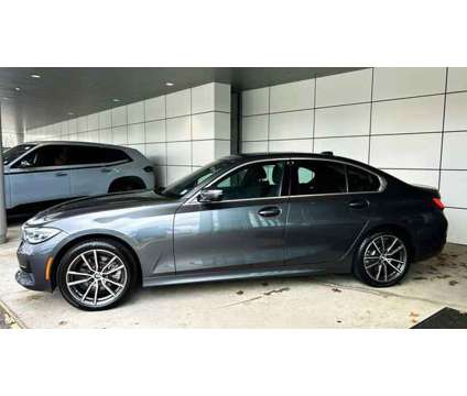 2021 BMW 3 Series xDrive is a Grey 2021 BMW 3-Series Sedan in Bay Shore NY