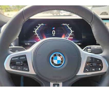 2024 BMW i4 xDrive40 is a White 2024 Sedan in Loveland CO