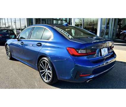 2021 BMW 3 Series xDrive is a Blue 2021 BMW 3-Series Sedan in Bay Shore NY