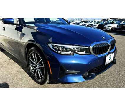 2021 BMW 3 Series xDrive is a Blue 2021 BMW 3-Series Sedan in Bay Shore NY