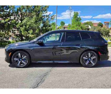 2025 BMW iX xDrive50 is a Black 2025 BMW 325 Model iX SUV in Loveland CO