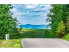 Jasper, This 3.26AC wooded lot has all-paved access from