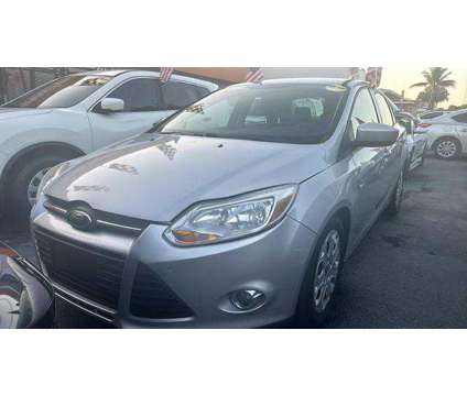 2012 Ford Focus for sale is a Silver 2012 Ford Focus Car for Sale in Hialeah FL
