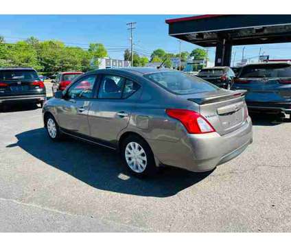 2016 Nissan Versa for sale is a Grey 2016 Nissan Versa 1.6 Trim Car for Sale in Charlotte NC