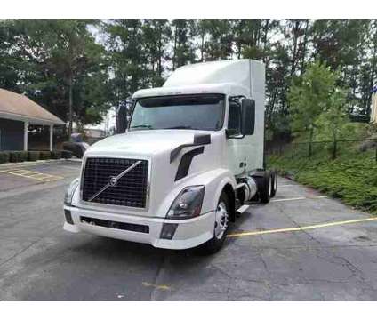 2014 Volvo Commercial VNL for sale is a White 2014 Car for Sale in Marietta GA