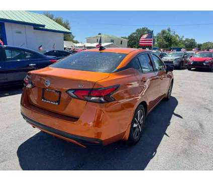2020 Nissan Versa for sale is a Orange 2020 Nissan Versa 1.6 Trim Car for Sale in Orlando FL