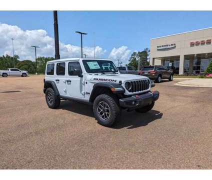 2024 Jeep Wrangler Rubicon is a White 2024 Jeep Wrangler Rubicon Car for Sale in Mccomb MS