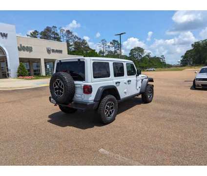 2024 Jeep Wrangler Rubicon is a White 2024 Jeep Wrangler Rubicon Car for Sale in Mccomb MS