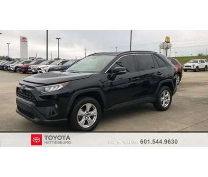 2021 Toyota RAV4 XLE is a Black 2021 Toyota RAV4 XLE Car for Sale in Hattiesburg MS