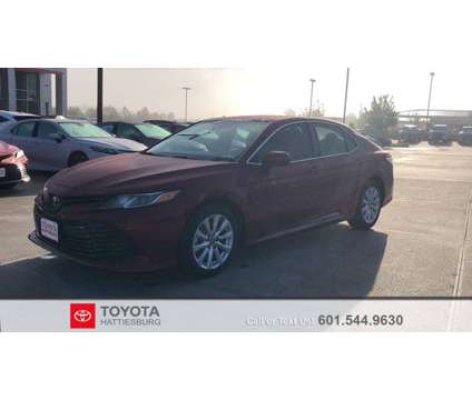 2020 Toyota Camry LE is a Red 2020 Toyota Camry LE Car for Sale in Hattiesburg MS