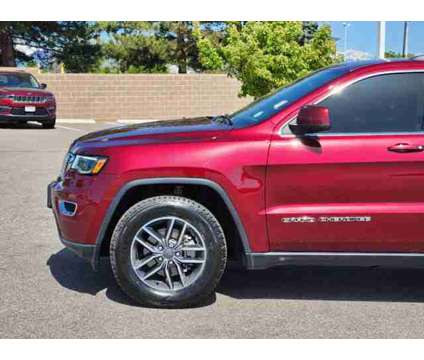 2020 Jeep Grand Cherokee Laredo E is a Red 2020 Jeep grand cherokee Laredo Car for Sale in Denver CO