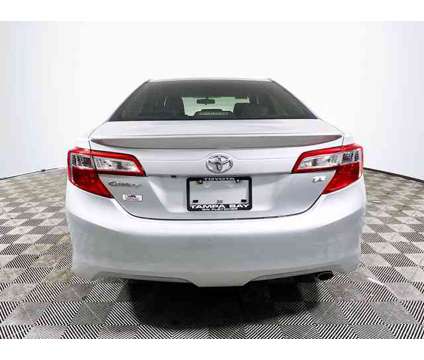 2014 Toyota Camry SE is a Silver 2014 Toyota Camry SE Car for Sale in Tampa FL