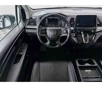 2022 Honda Odyssey Elite is a Silver, White 2022 Honda Odyssey Elite Car for Sale in Saint Charles IL
