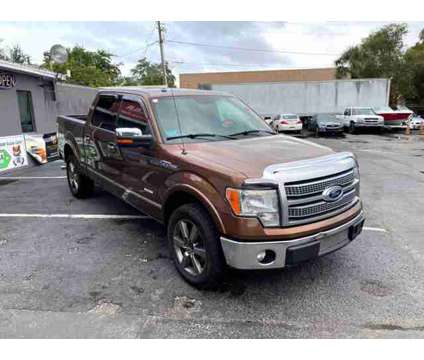 2012 Ford F150 SuperCrew Cab for sale is a Brown 2012 Ford F-150 SuperCrew Car for Sale in Orlando FL