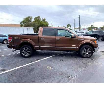 2012 Ford F150 SuperCrew Cab for sale is a Brown 2012 Ford F-150 SuperCrew Car for Sale in Orlando FL