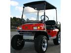 EZ-GO Lifted Orange 36 Volt Electric Golf Cart