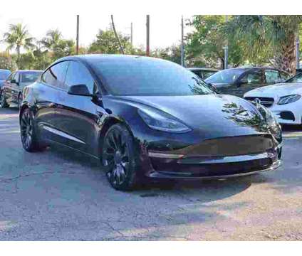 2021 Tesla Model 3 Performance is a Black 2021 Tesla Model 3 Sedan in Miami FL