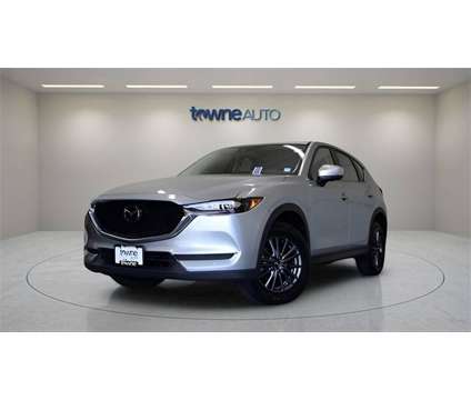 2021 Mazda CX-5 Touring is a Silver 2021 Mazda CX-5 Touring SUV in Orchard Park NY