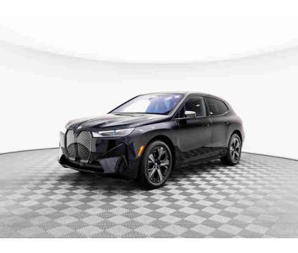 2024 BMW iX xDrive50 is a Black 2024 BMW 325 Model iX Car for Sale in Barrington IL