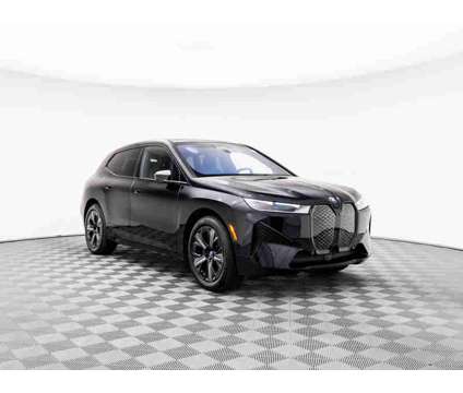 2024 BMW iX xDrive50 is a Black 2024 BMW 325 Model iX Car for Sale in Barrington IL
