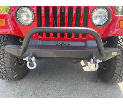 2004 Jeep Wrangler Sport is a Red 2004 Jeep Wrangler Sport SUV in Cary NC